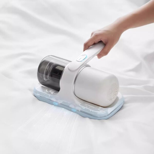 976533b5-ecd9-44df-a32c-dc2906d5c54b.jpg Portable Vacuum Powerful Bed Vacuum Cleaner: Lightweight Deep Cleaning!