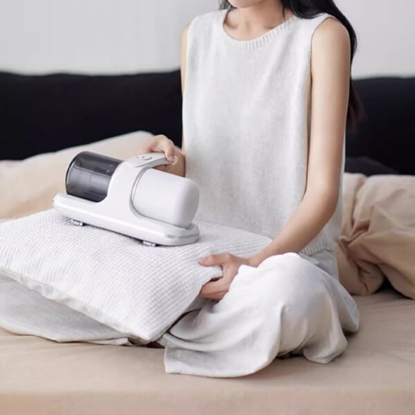 f1bd3777-44d4-4698-bc17-797defb2a6df.jpg Portable Vacuum Powerful Bed Vacuum Cleaner: Lightweight Deep Cleaning!